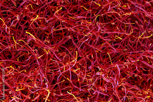 Saffron spice. A large number of dried saffron stamens. photo