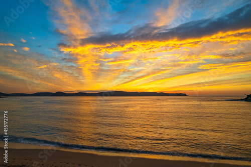 Fototapeta Naklejka Na Ścianę i Meble -  High Cloud Sunrise Seascape with Soft Shades of Colour