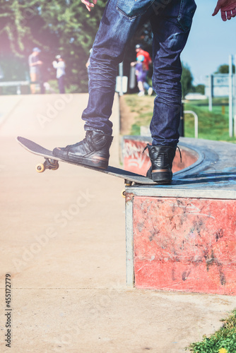 a skateboarder in action doing tricks on ramps at a skate park