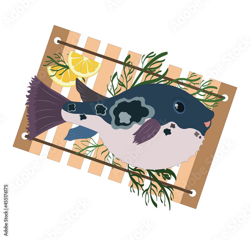 Funny puffer fish on a board with dill and lemons.
