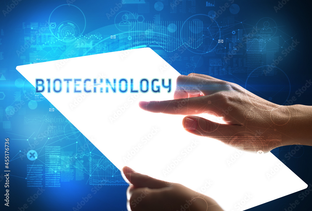 Hand holdig futuristic tablet , technology concept Hand holdig futuristic tablet , technology concept