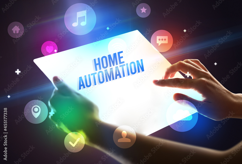 Holding futuristic tablet, new media concept Holding futuristic tablet, new media concept