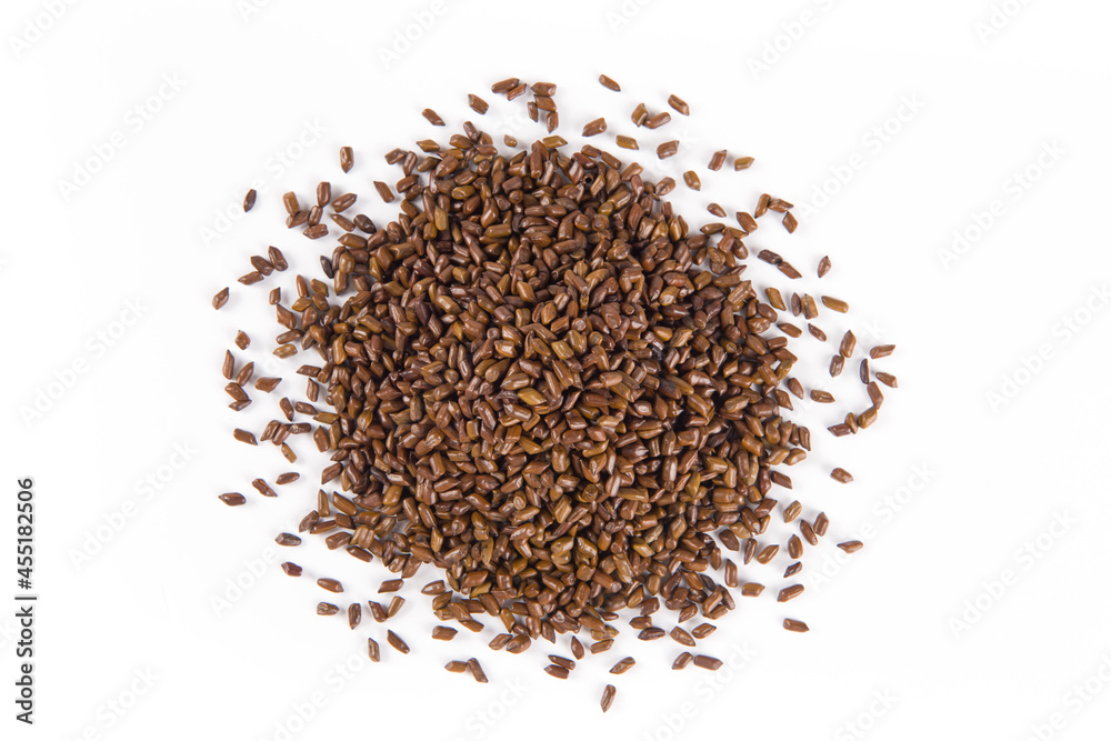 Chinese herbal medicine cassia seeds on white background Chinese herbal medicine cassia seeds on white background