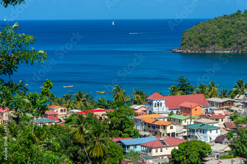 Small fishing village on St Lucia.  Caribbean colored houses and bay. photo