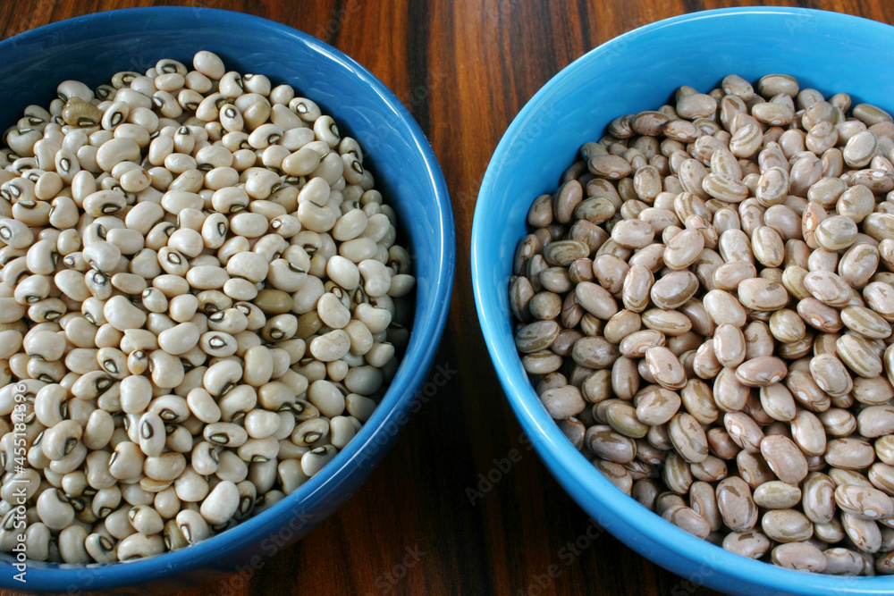 Assorted beans. Carioca beans, black eyed beans. Beans bowl on wooden background. Assorted beans. Carioca beans, black eyed beans. Beans bowl on wooden background.