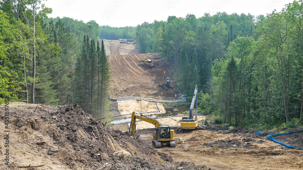 Line 3 Oil Pipeline construction site through forest land in Minnesota.