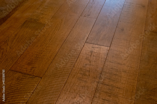Fototapeta Naklejka Na Ścianę i Meble -  Hard wood natural floor for use as texture background, with planks at a slight angle.