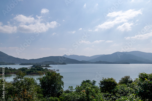 The lake and blue sky and white clouds in the backlight © chen