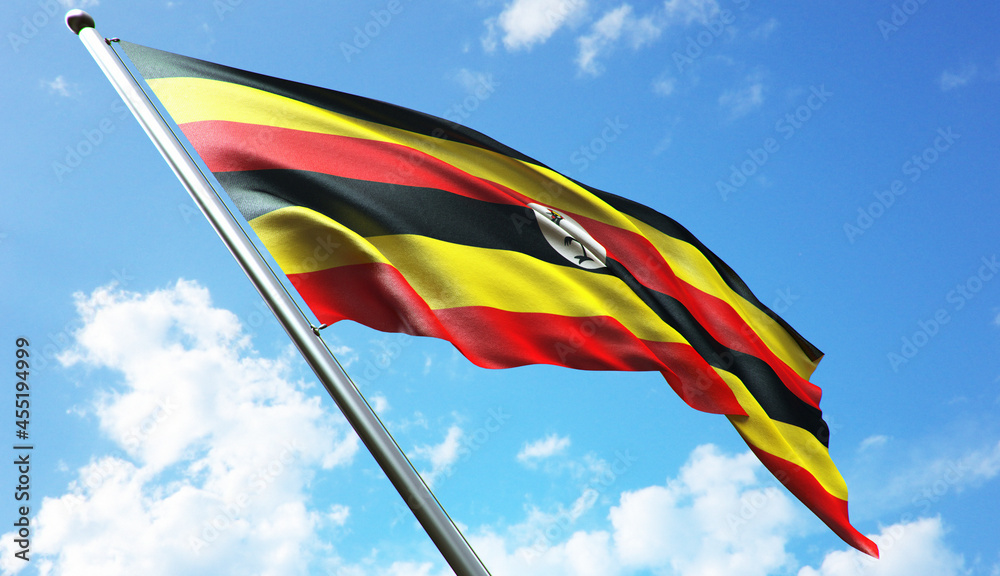 3D rendering illustration of the Uganda flag with a blue sky background 3D rendering illustration of the Uganda flag with a blue sky background