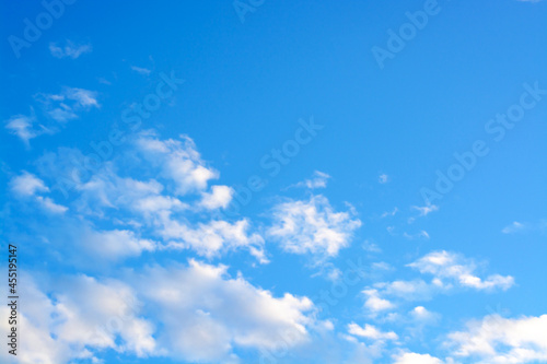 Photography Background with white clouds from the corner edge and blue sky