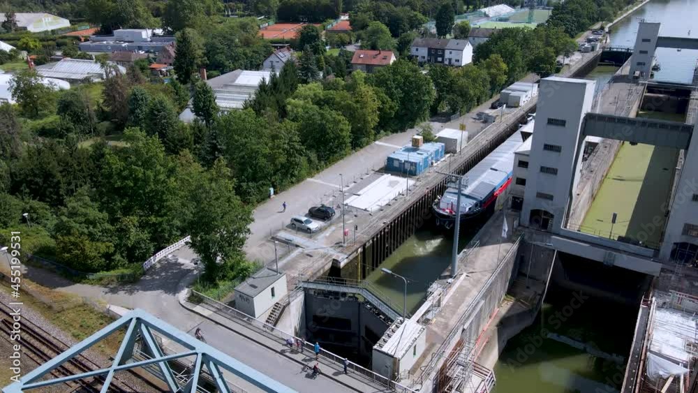 4K clip revealing a bridge and a floodgate designed for ships in Mannheim, Germany, called Schleuse Feudenheim 4K clip revealing a bridge and a floodgate designed for ships in Mannheim, Germany, called Schleuse Feudenheim