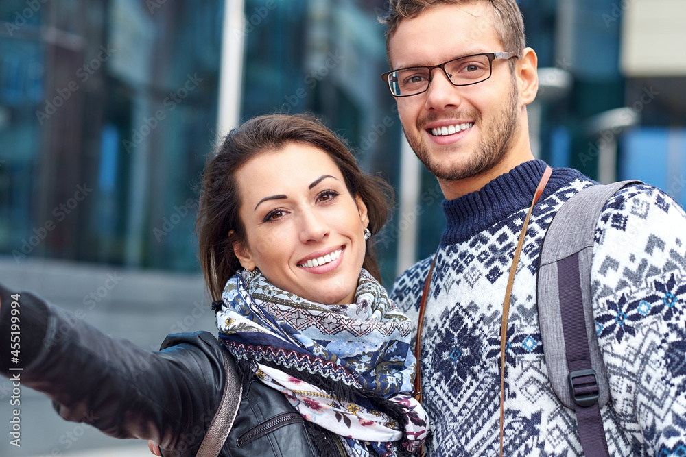 Happy love couple of tourists taking selfie in urban city Happy love couple of tourists taking selfie in urban city