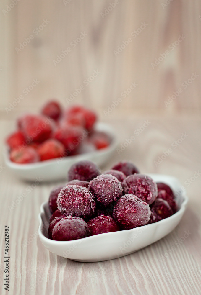 frozen cherry on ceramic bowl, frozen berries, healthy nutrition frozen cherry on ceramic bowl, frozen berries, healthy nutrition