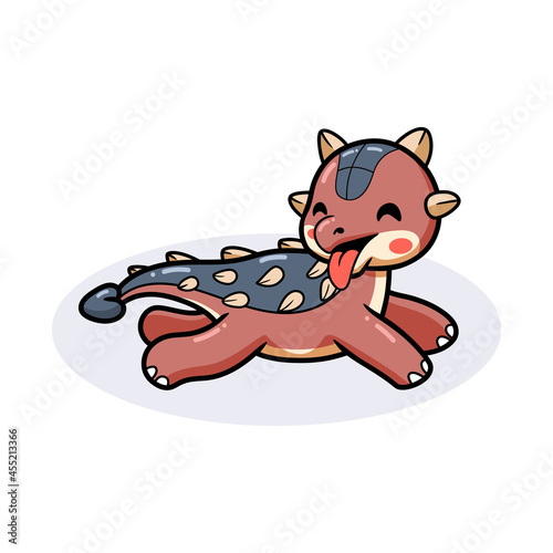 Cute little ankylosaurus dinosaur cartoon showing tongue