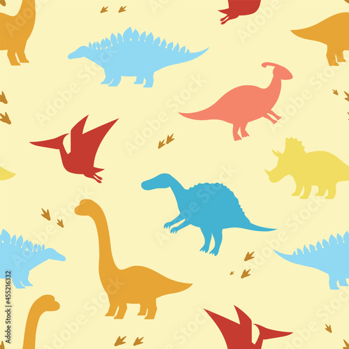 Fototapeta Naklejka Na Ścianę i Meble -  Seamless child dino pattern. Silhouettes of dinosaurs on a yellow background. Backdrop for wallpaper, textile, fabric, wrapping.