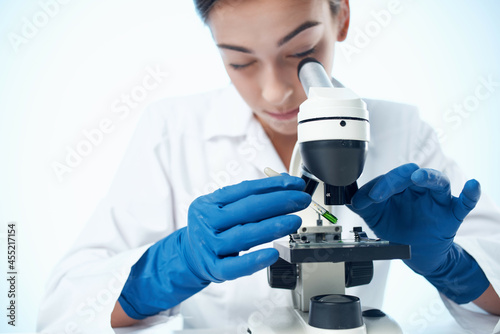 woman scientist biologist research diagnostics technology