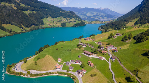 The beautiful village of Lungern and its lake, Switzerland.  photo