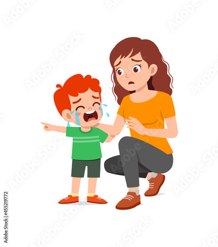 young mother hug crying little boy and try to comfort