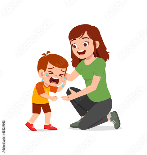 young mother hug crying little boy and try to comfort