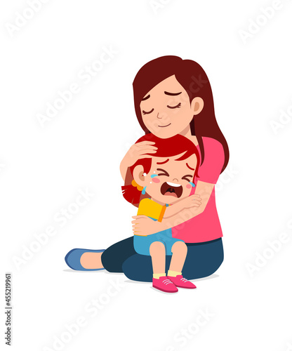 young mother hug crying little girl and try to comfort