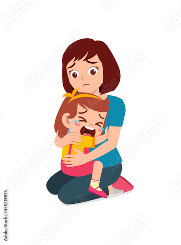 young mother hug crying little girl and try to comfort