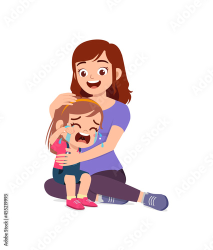 young mother hug crying little girl and try to comfort