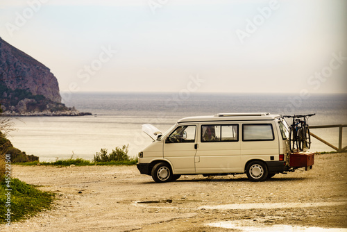 Broken camper van on seaside cliff  Spain