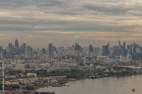 Bangkok, thailand - May 29, 2020 : Beautiful view of Bangkok city, Beauty skyscrapers along Chaopraya river in the evening, making the city modern style. Selective focus.