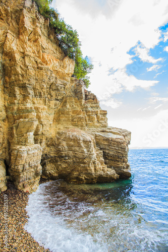 Amazing rocks formation on the sea shore, summer travel destination 