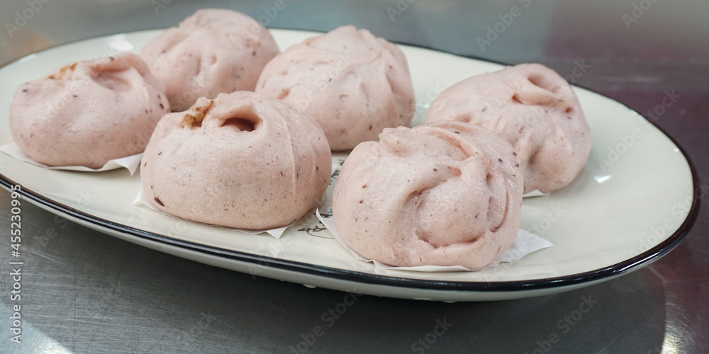 steamed fresh sweet red bean lotus paste bun baozi on dark grey wood background dim sum halal menu steamed fresh sweet red bean lotus paste bun baozi on dark grey wood background dim sum halal menu