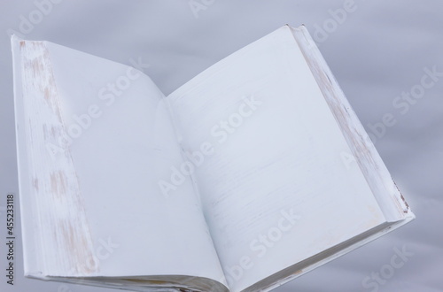 blank white open book on a uniform backgroundblank white open book photo