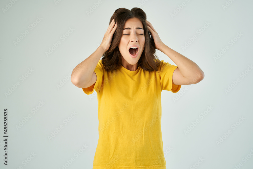 shocked woman covering her face with hand open mouth emotions cropped view