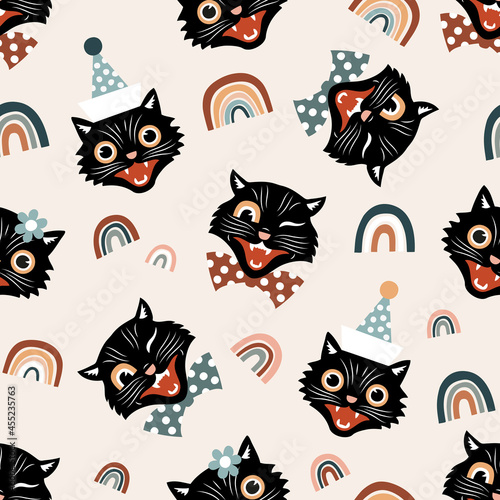 Vintage black cats and rainbows seamless vector pattern.