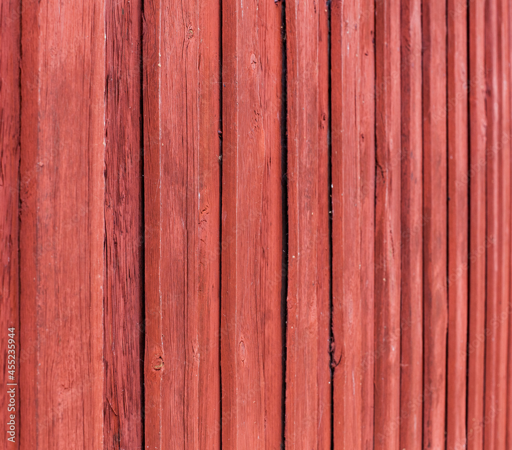 Schwedisches Haus. Rote Hausfassade aus Holz. Hintergrund. Background. Swedisch House. Old red color wooden facade.. Schwedisches Haus. Rote Hausfassade aus Holz. Hintergrund. Background. Swedisch House. Old red color wooden facade..