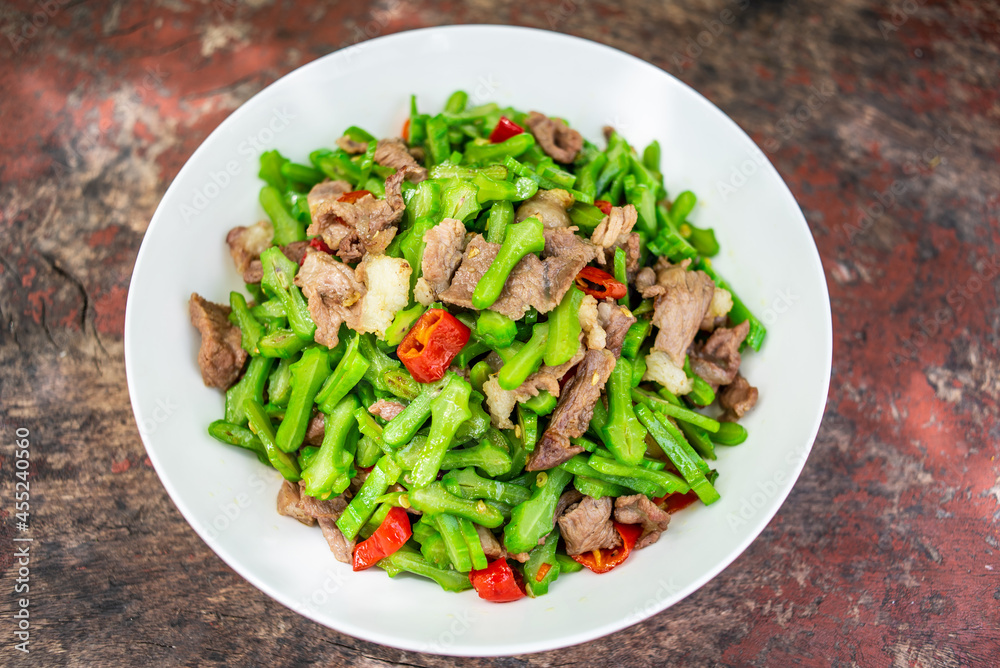 A dish of fried pork with concanavali beans in Hunan, China A dish of fried pork with concanavali beans in Hunan, China