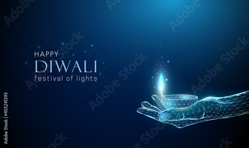 Abstract low poly giving hand with Diwali lamp