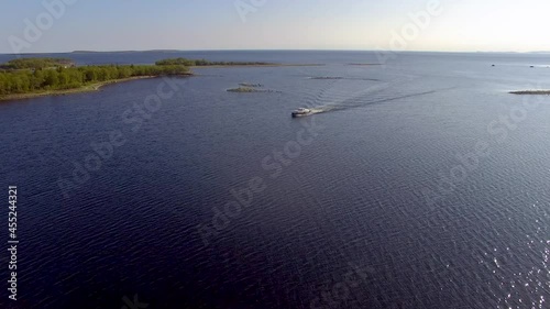 Solovki Russia the boat enters the bay aerial drone footage 4K
