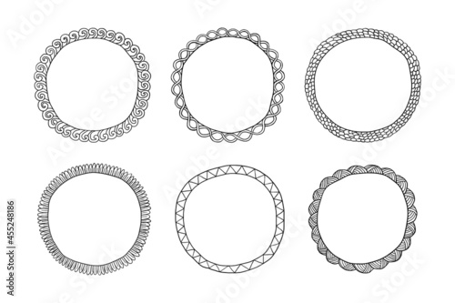Set of hand-drawn round frames. Ornament in a circle isolated. Free hand drawn frames. Vector illustration of a photo frame with copy space.