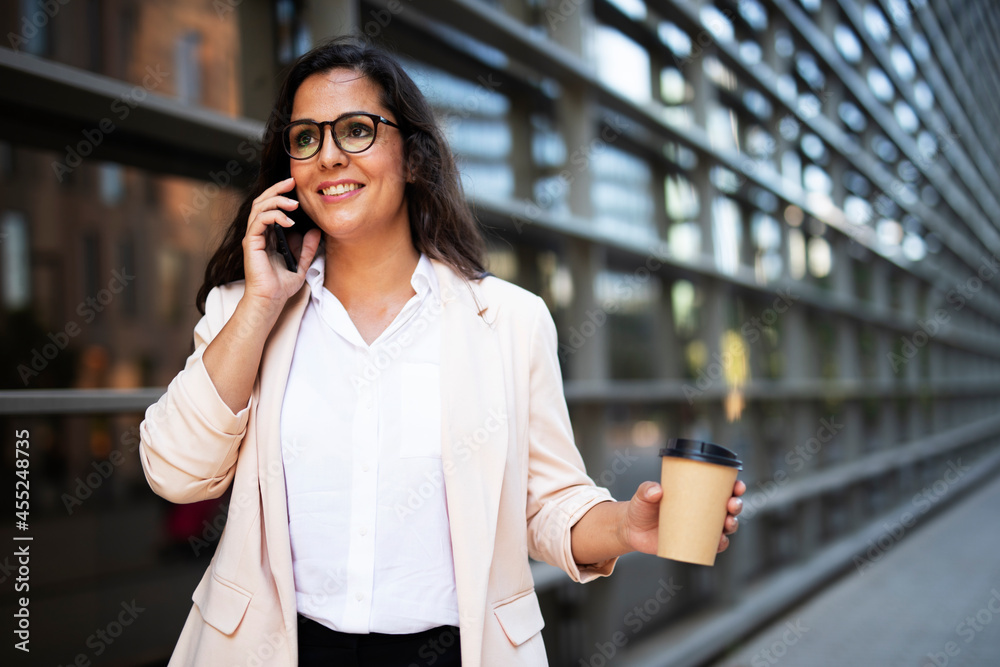 Young businesswoman on the phone. Female manager talking to the phone.. Young businesswoman on the phone. Female manager talking to the phone..