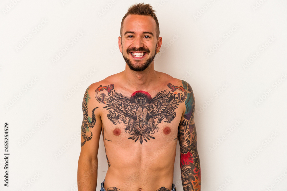 Fototapeta premium Young caucasian man without t-shirt isolated on white background happy, smiling and cheerful.