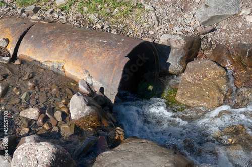 culvert was washed away by the waters of stream photo