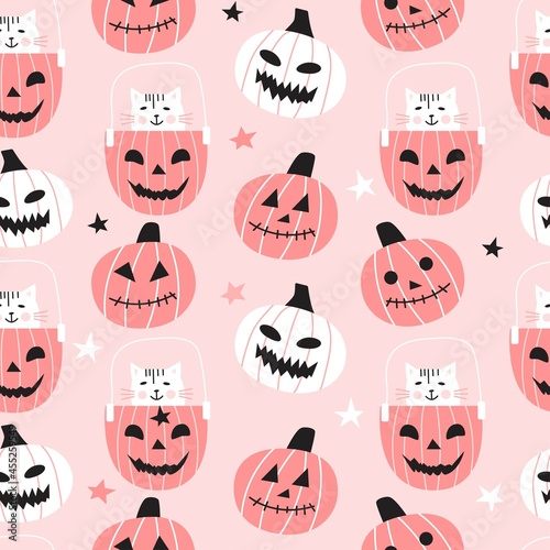 Seamless pattern with cute pumpkins and cats on pink background. Halloween design for fabric and paper, surface textures. Pastel colors design.