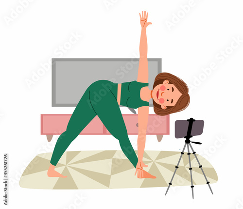 The girl takes online classes on the phone, does yoga. The concept of Stay at home. Live broadcast, online education. A female cartoon character practicing hatha yoga. A woman does sports indoors.