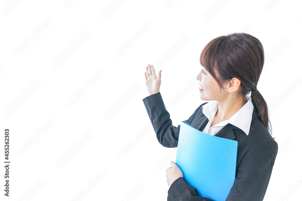 指をさすビジネスウーマン