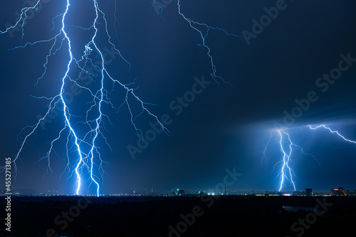 Lightning strike over night city