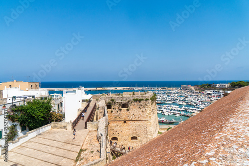 Otranto, Apulia, Italy - August, 17, 2021: view of the harbor from the Aragonese castle of Otranto