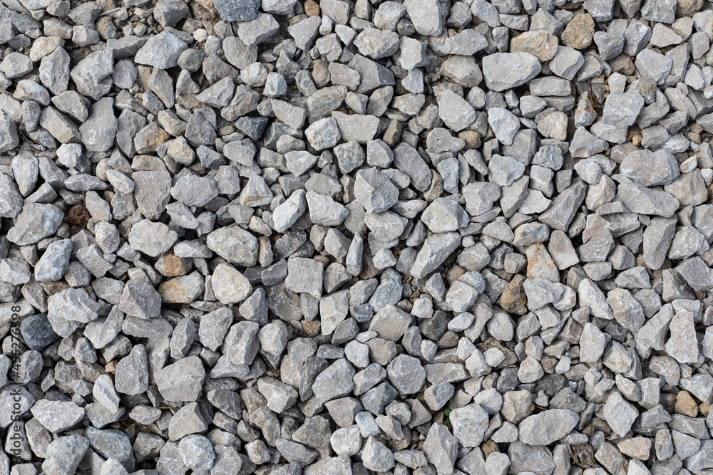 The texture of gray rubble on the road, horizontal orientation The texture of gray rubble on the road, horizontal orientation