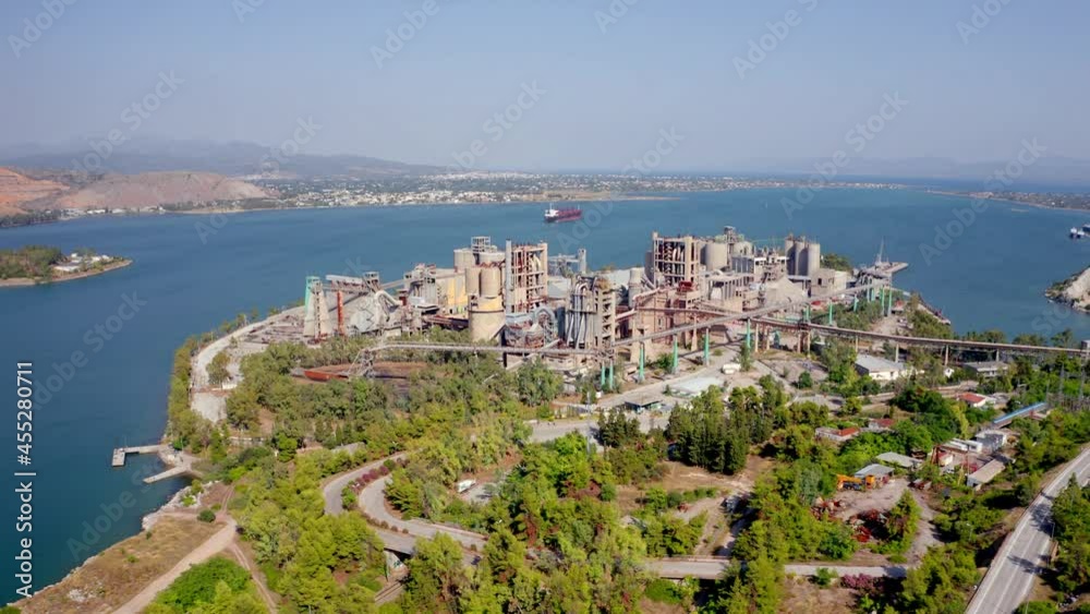 4k drone forward video (Ultra High Definition) of industrial enterprise. Sunne summer scene of Peloponnese peninsula, Greece, Europe. Industry concept background.. 4k drone forward video (Ultra High Definition) of industrial enterprise. Sunne summer scene of Peloponnese peninsula, Greece, Europe. Industry concept background..