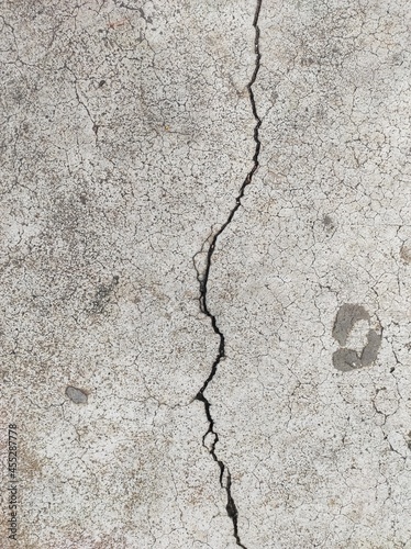 Non-standard concrete floor cracks., concrete crack background.
