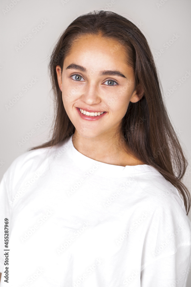 Close up portrait of a young beautiful happy brunette girl Close up portrait of a young beautiful happy brunette girl
